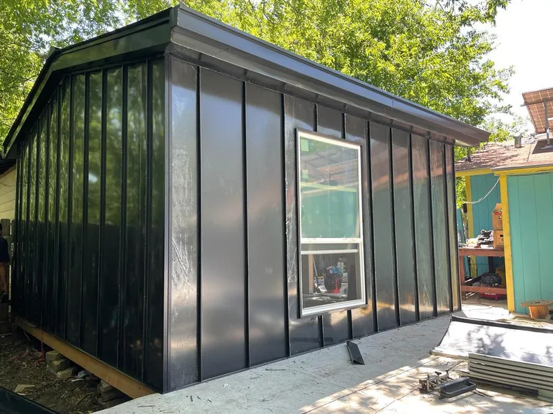 Black standing seam metal wall panels for Roof Inspection in Brownwood