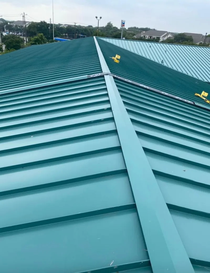 Green commercial metal roof ridge and valley for Metal Roof Repair in Brownwood