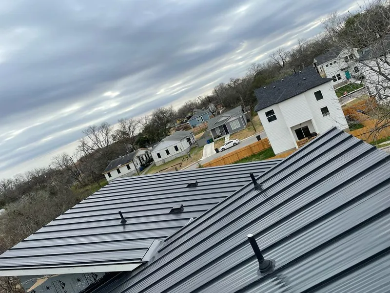 Standing seam metal roof panels with vents for Skylight Repair in Brownwood